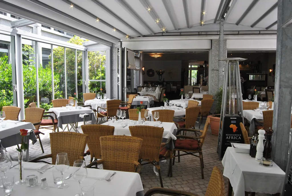 Mediterraner Ganzjahres-Garten des Ristorante Cortile